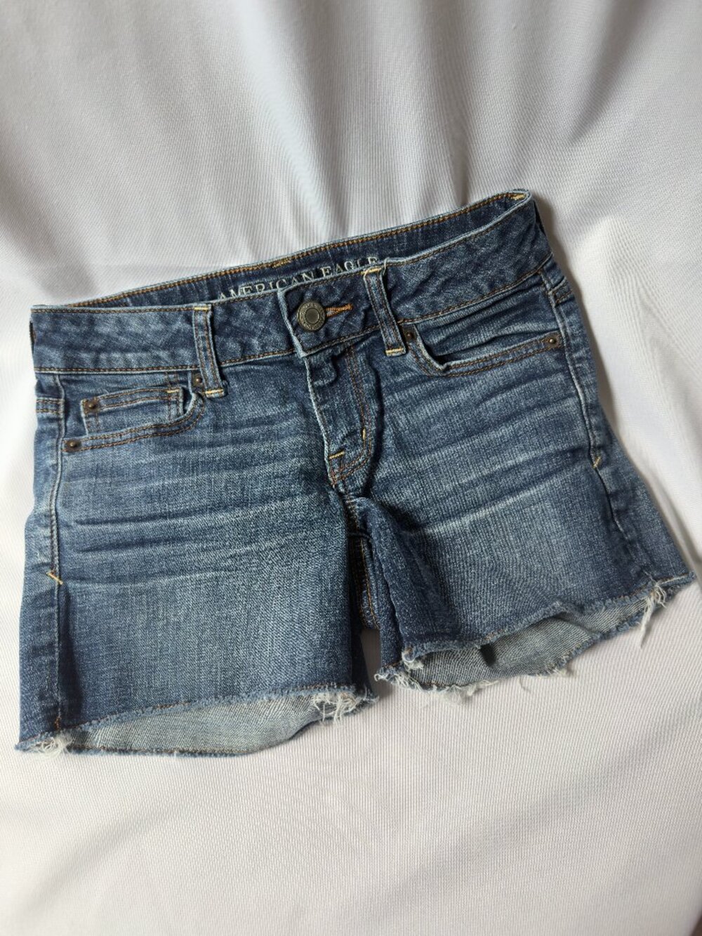 American Eagle Cut Off Denim Shorts Size 0 Super Stretch Frayed Hem Raw Cut 3863